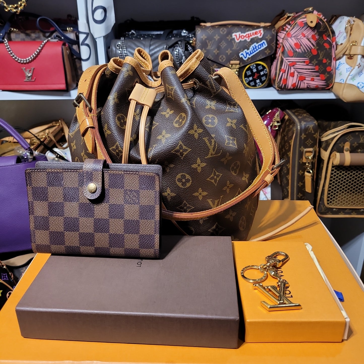 Set of Louis Vuitton bundle of Noe, agenda cover and bag charm