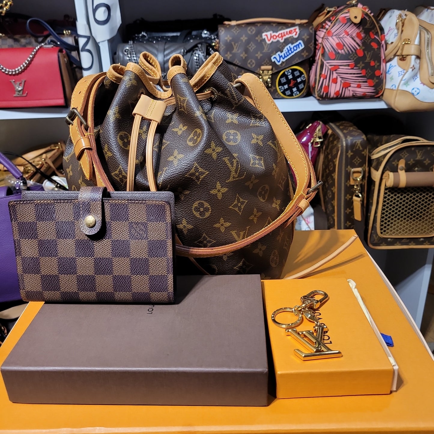Set of Louis Vuitton bundle of Noe, agenda cover and bag charm