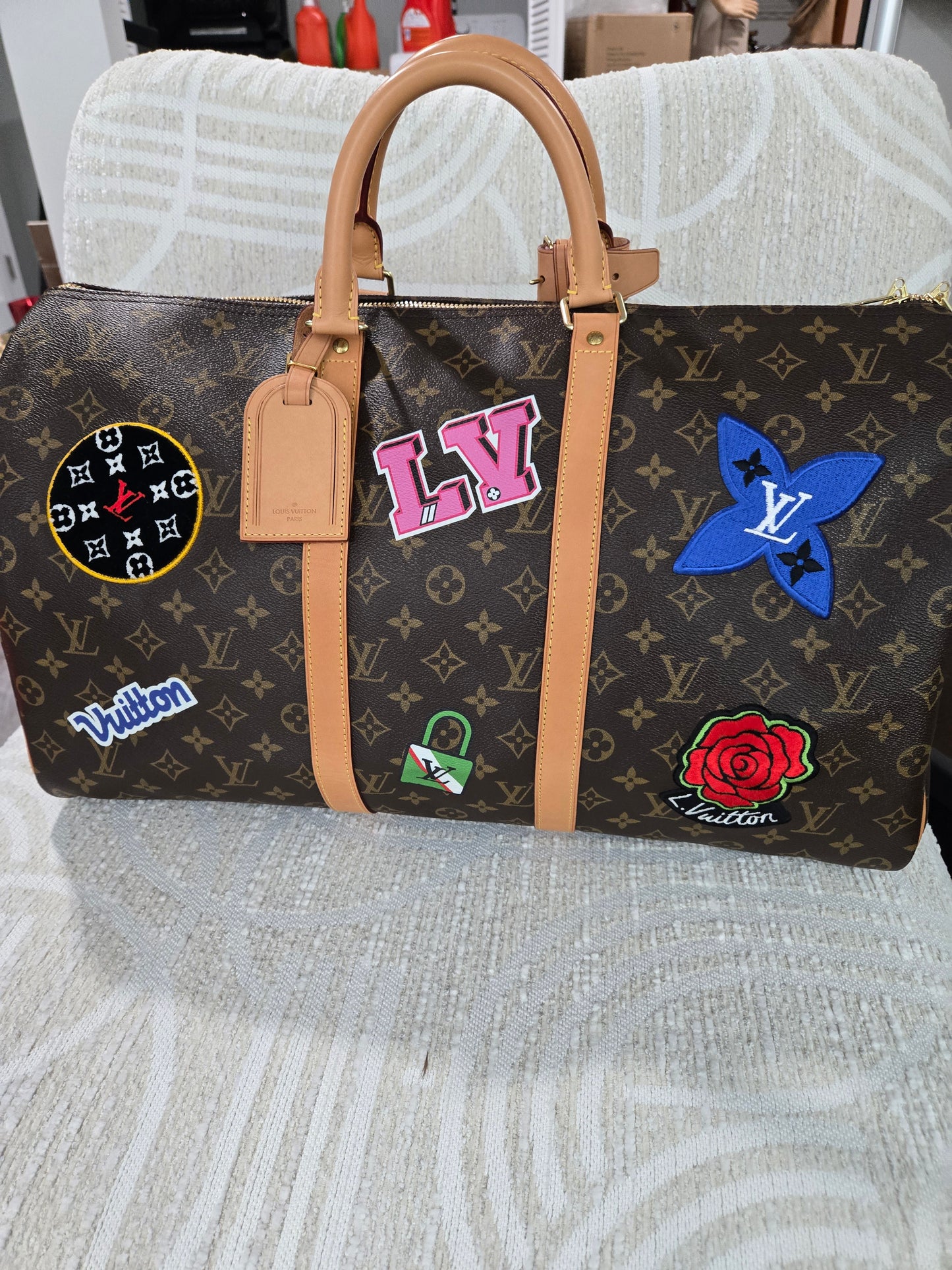 Pre-owned Louis Vuitton patches keepall 50 Bandouliere and bag charm